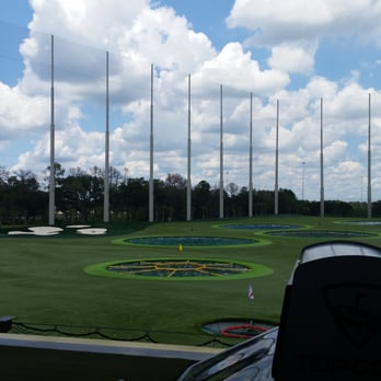 Topgolf - Make it in the colored holes and score POINTS. This is better than real golf - New American Near Me - Tampa, Florida Topgolf - Make it in the colored holes and score POINTS. This is better than real golf - New American Near Me - Tampa, Florida