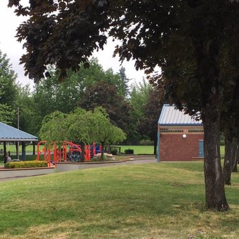 Red Sunset Park - Shelters are in between playground areas near the restrooms & parking lot. - Parks Near Me - Gresham, Oregon Red Sunset Park - Shelters are in between playground areas near the restrooms & parking lot. - Parks Near Me - Gresham, Oregon