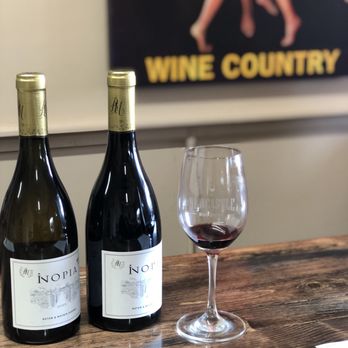 Newcastle Wine Shoppe - two bottles of wine and a glass of wine - Beer, Wine & Spirits Near Me - Newcastle, California Newcastle Wine Shoppe - two bottles of wine and a glass of wine - Beer, Wine & Spirits Near Me - Newcastle, California