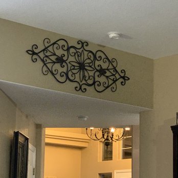 Hanging Around Town - Iron decorative piece - Art Installation Near Me