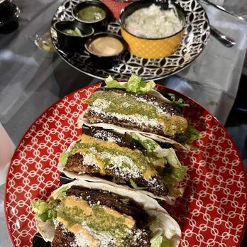 LA Cajun Table - Fish tacos. Best seafood tacos I've had in a long time! Lots of sides and amazing sauces!! - Cajun/Creole Near Me - Sugar Land, Texas