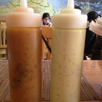 Arepas Cafe - Yum sauce! - Venezuelan Near Me - Astoria, New York