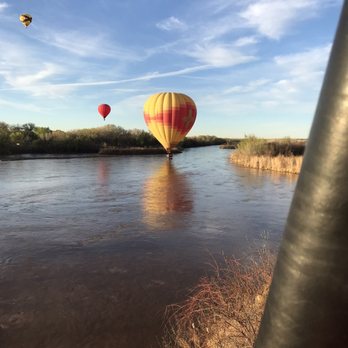 Rainbow Ryders - Rainbow Ryder's balloon over the Rio Grande - Hot Air Balloons Near Me - Albuquerque, New Mexico