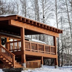 Teton Signature Builders - Beautiful and spacious covered deck addition on a home in Alta, Wyoming.