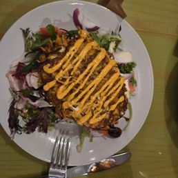 Sweet potato encrusted Wahoo over salad, was excellent!! Sweet potato encrusted Wahoo over salad, was excellent!!