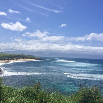 Hookipa Beach Park - Surfers Riding a Wave - Ho'okipa Beach Park - Parks Near Me - Paia, Hawaii