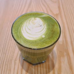 Matcha Latte with house syrup (apple spice). Delish