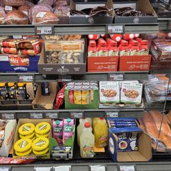 Organic heavy cream, juices, dips and more in the meat case. . .