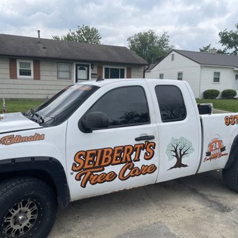 Seiberts Tree Care - a truck parked in front of a house - Landscaping Near Me Seiberts Tree Care - a truck parked in front of a house - Landscaping Near Me