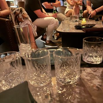 Naya - Empty water glasses in a half empty restaurant while the staff stood around. - Mediterranean Near Me - Austin, Texas