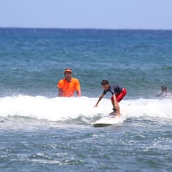 Blue Rush Surf School - J applying Matthew's knowledge and SURFING!