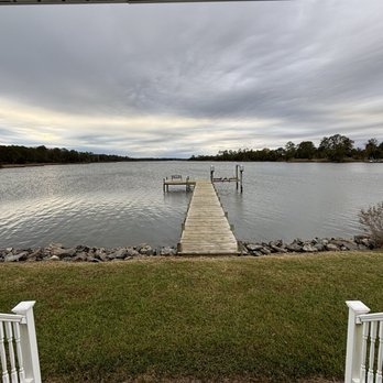 Inn At Warner Hall - View of the dock from the boathouse. - Hotels Near Me - Gloucester, Virginia Inn At Warner Hall - View of the dock from the boathouse. - Hotels Near Me - Gloucester, Virginia