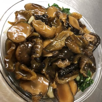 Shanghai - a plate of mushrooms and broccoli - Chinese Near Me - London, Ontario Shanghai - a plate of mushrooms and broccoli - Chinese Near Me - London, Ontario
