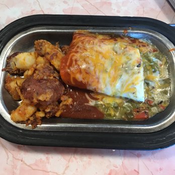 Pantry Restaurant - Breakfast Burrito split Christmas style with corned beef and papas. - Breakfast & Brunch Near Me - Santa Fe, New Mexico Pantry Restaurant - Breakfast Burrito split Christmas style with corned beef and papas. - Breakfast & Brunch Near Me - Santa Fe, New Mexico
