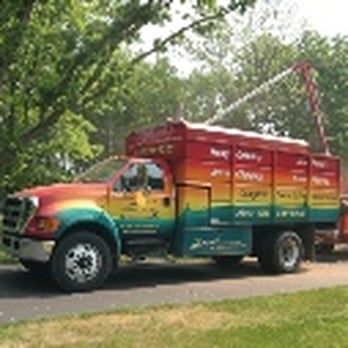Larry's Lawn Service - a rainbow truck - Snow Removal Near Me - Grand Rapids, Michigan Larry's Lawn Service - a rainbow truck - Snow Removal Near Me - Grand Rapids, Michigan