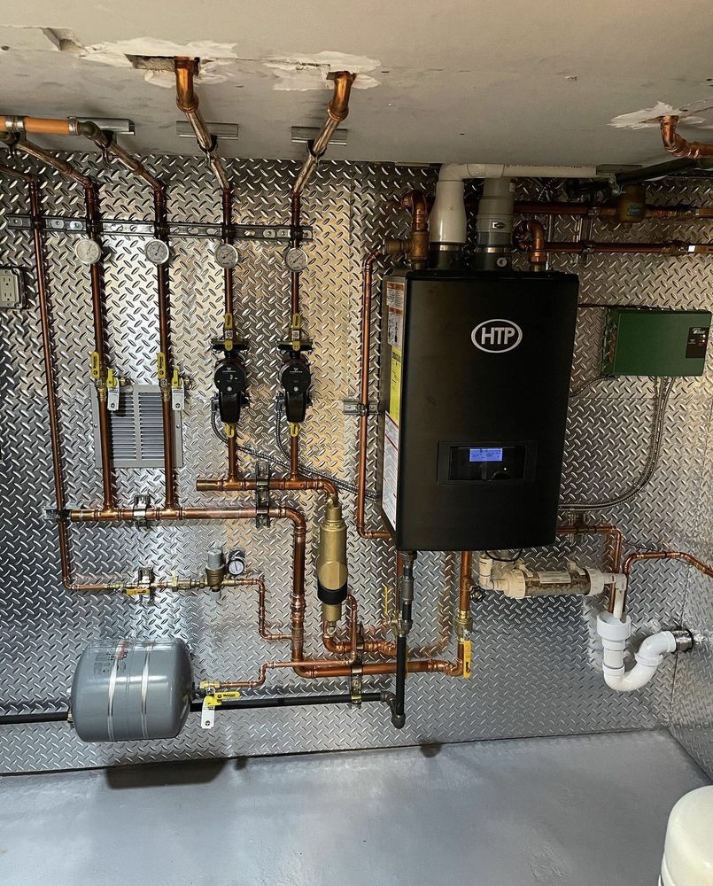 Slide of Wilson's Plumbing Heating HVAC & Electric