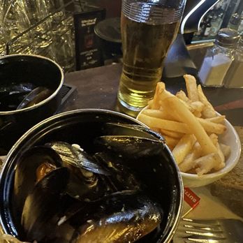 PJ O'Brien's Irish Pub - Garlic wine Mussel Pot with chips. - Irish Pub Near Me - Melbourne, VIC PJ O'Brien's Irish Pub - Garlic wine Mussel Pot with chips. - Irish Pub Near Me - Melbourne, VIC