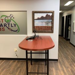 Test Smartly Labs of Overland Park - Internal working area and view down the exam room hallway.