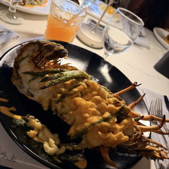 Sunset Grille - Lobster stuffed with Mac & cheese and asparagus - American Near Me - Charlotte Amalie, Virgin Islands Sunset Grille - Lobster stuffed with Mac & cheese and asparagus - American Near Me - Charlotte Amalie, Virgin Islands