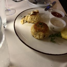 The crab cake dinner. It said crab cakes. And horrible plating. 55$ for that The crab cake dinner. It said crab cakes. And horrible plating. 55$ for that