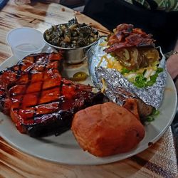 Bluegrass BBQ - Bourbon-glazed, thick-cut Pork Chop, vinegar Collards, bread and a 2lb loaded Baked Potato (as a SIDE!!!). All for just - $14.99!!!!
