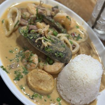 Autentico - Pescado a Lo Macho - fried fish in creamy seafood sauce - Peruvian Near Me - Great Falls, Virginia Autentico - Pescado a Lo Macho - fried fish in creamy seafood sauce - Peruvian Near Me - Great Falls, Virginia