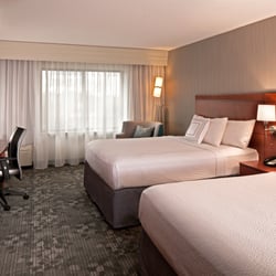 Courtyard by Marriott Hartford Farmington - Each renovated hotel room has comfy new furnishings, flat-screen TVs and plush Marriott bedding.