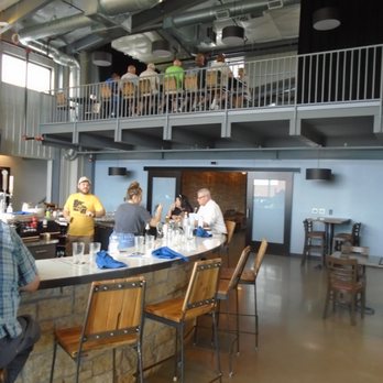 45th Parallel Distillery - The bar and balcony. - Pizza Near Me - New Richmond, Wisconsin