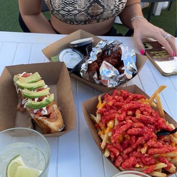 The Boxyard - Sonoran dog, mango habanero wings & cheese fries with hot cheetos! - New American Near Me - Tucson, Arizona The Boxyard - Sonoran dog, mango habanero wings & cheese fries with hot cheetos! - New American Near Me - Tucson, Arizona