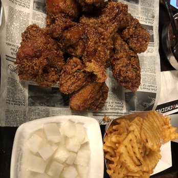 CM Chicken - Whole chicken Soy Garlic Tikku, it's a little spicy, $27  Waffle fries on the house, thank you!  Complementary Pickled Daikon - Korean Near Me - Montclair, New Jersey