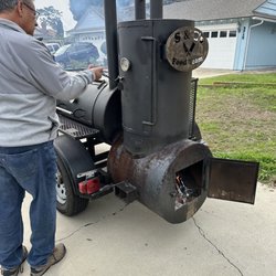 S&E'S Food Team - S&M's "small" smoker. Everyone loved enjoyed watching them cook almost as much as the bbq they made