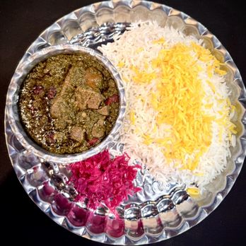 Caspian Kababs - Ghorme Sabzi is a traditional Persian stew made with tender lamb, kidney beans, and dried limes, infused with aromatic herbs. It's served wi - Mediterranean Near Me - Edmonton, Alberta