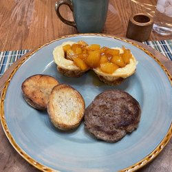 Ponderosa Ridge A Bed and Breakfast - This was sort of like an eggy soufflé filled with spiced peaches, sausage and one of the best crunchy potatoes I have ever had