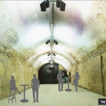 The Mockbee - silhouettes of people in a tunnel - Bars Near Me - Cincinnati, Ohio
