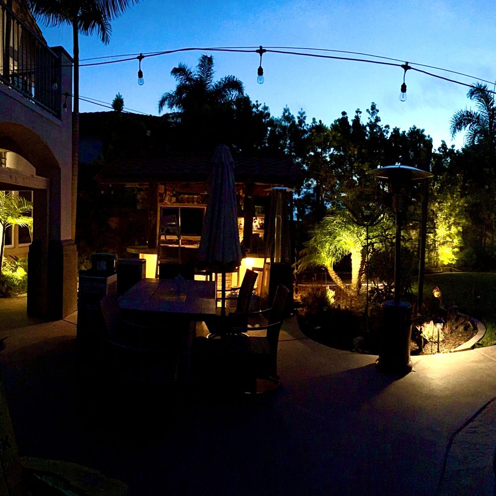 Premier Landscape Lighting - Lighting in the backyard (left) - Lighting Fixtures & Equipment Near Me