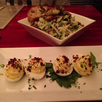 Salty Sow - Truffled devil eggs and brussel sprouts Cesar salad. - American Near Me - Austin, Texas