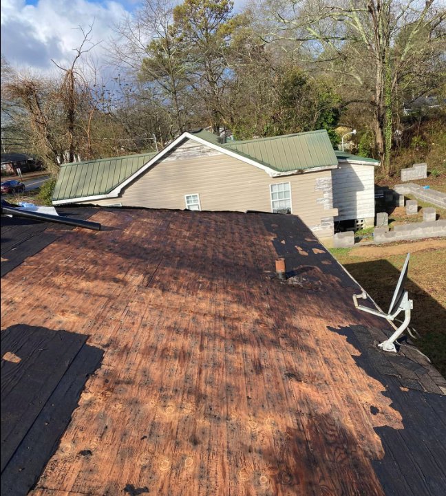 Slide of Backwoods Roofing