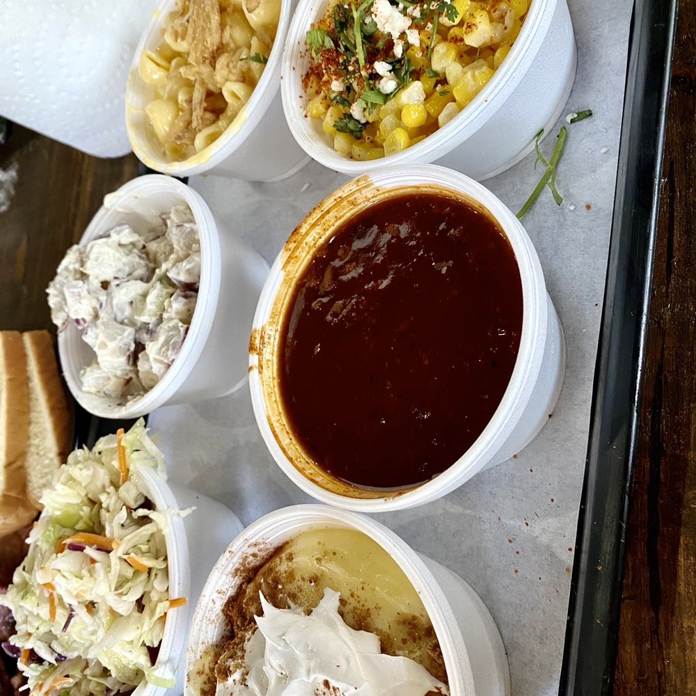 Speakeasy BBQ - Sides that Quattro's platter : coleslaw, potato salad,Mac & cheese, Mexican corn, chili beans and banana pudding with whipped cream . - Barbeque Near Me - Norco, California Speakeasy BBQ - Sides that Quattro's platter : coleslaw, potato salad,Mac & cheese, Mexican corn, chili beans and banana pudding with whipped cream . - Barbeque Near Me - Norco, California