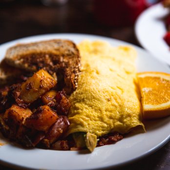 Famous Toastery - The Avocado Omelette with Breakfast Potatoes - Breakfast & Brunch Near Me - Davidson, North Carolina