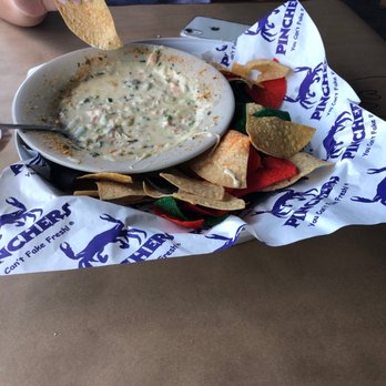 Pinchers - Hot crab and cheese dip - Seafood Near Me - Marco Island, Florida Pinchers - Hot crab and cheese dip - Seafood Near Me - Marco Island, Florida