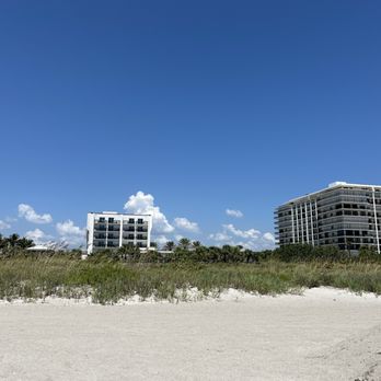 Hilton Garden Inn - Cocoa Beach - The hotel from the very clean beach. Easy access from the pool area with a beach shower. - Hotels Near Me - Cocoa Beach, Florida