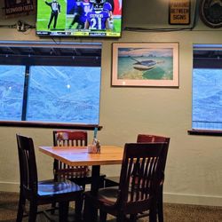 Rooster's Waterfront Restaurant - View of the river from the dining room at Roosters Restaurant.