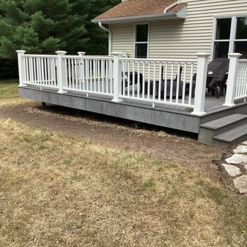 G2 Landscape - a deck with a chair on it - Landscaping Near Me G2 Landscape - a deck with a chair on it - Landscaping Near Me
