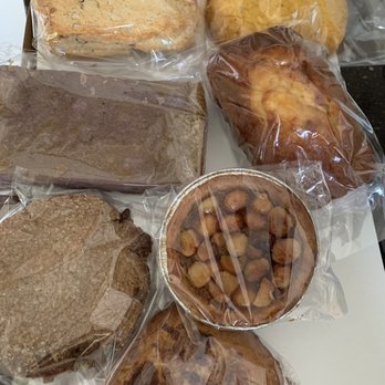 Maui Bread - Almond scone, almond cookie, coconut bread, bourbon Mac nut pie, peanut butter bacon cookie, ginger snap, ube mochi (clockwise) - Bakeries Near Me - Kihei, Hawaii