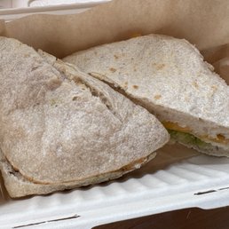 Turkey Pesto Sandwich: Ciabatta bread with turkey, pesto, cheddar cheese and garlic mayo