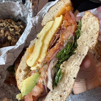 The Bronx Bagel Buggy - Everything bagel, Standard with arugula, bacon, tomatoes, onions and avocados - Bagels Near Me - Chamblee, Georgia The Bronx Bagel Buggy - Everything bagel, Standard with arugula, bacon, tomatoes, onions and avocados - Bagels Near Me - Chamblee, Georgia