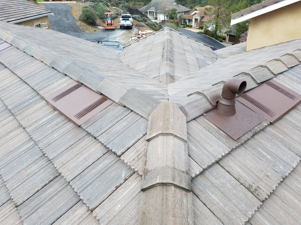 Slide of Trinity Roofing