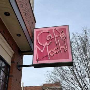 Cafe Mochi - a neon sign hanging from the side of a building - Sushi Bars Near Me - St Louis, Missouri