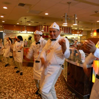 Johnny Rockets - a group of chefs in a restaurant - Burgers Near Me - West Mifflin, Pennsylvania Johnny Rockets - a group of chefs in a restaurant - Burgers Near Me - West Mifflin, Pennsylvania