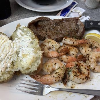 Boardwalk Bar & Grill - Steak and shrimp hit the spot along with the baked tater and homemade coleslaw. Nice portion so I shared some with Chris. Lol. - Pizza Near Me - Big Pine Key, Florida Boardwalk Bar & Grill - Steak and shrimp hit the spot along with the baked tater and homemade coleslaw. Nice portion so I shared some with Chris. Lol. - Pizza Near Me - Big Pine Key, Florida